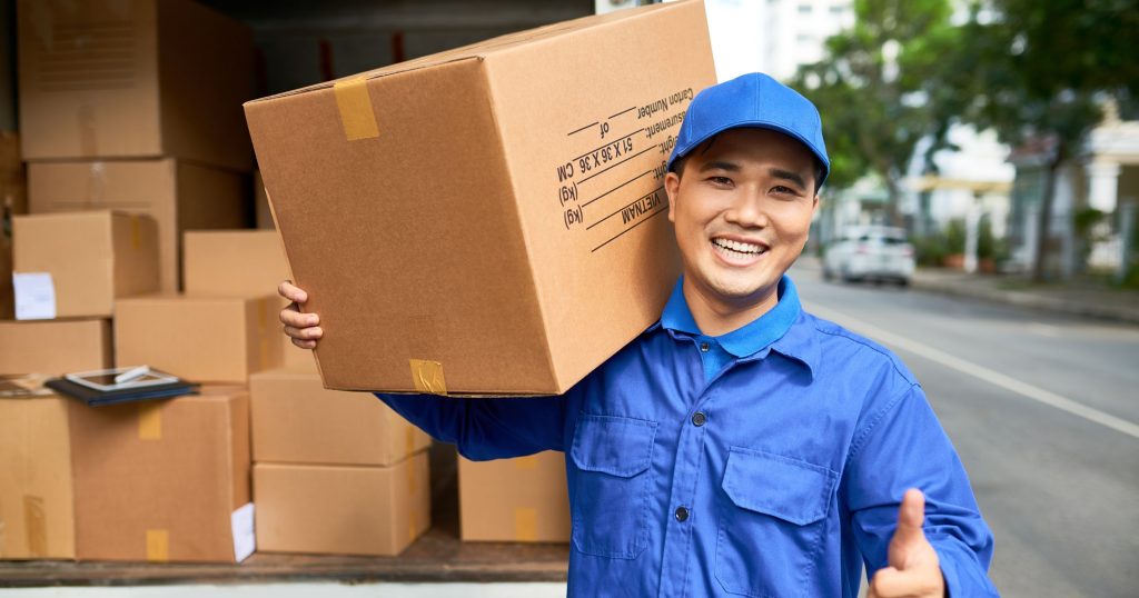 delivery man holding parcel box