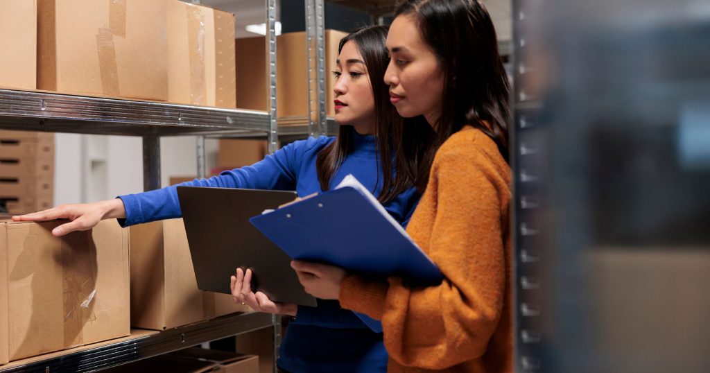 warehouse workers managing inventory