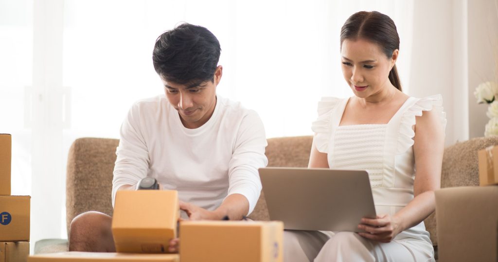 business owners packing orders for delivery