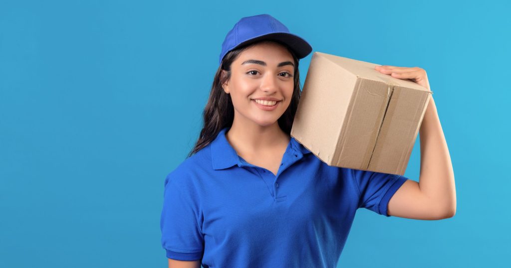 delivery girl blue uniform cap holding boxpackage